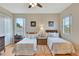 Charming bedroom with two twin beds, complemented by a bright window and cheerful decor at 2631 Captains Ct, Kissimmee, FL 34746