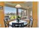 Breakfast nook with large bay window, providing ample natural light and views of the outdoors at 2631 Captains Ct, Kissimmee, FL 34746