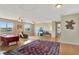 Living room featuring hardwood floors, a ceiling fan, and lots of natural light at 2631 Captains Ct, Kissimmee, FL 34746