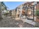 A secluded backyard with a screened-in patio, perfect for outdoor living at 2745 Corvette Ln, Kissimmee, FL 34746