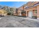 Multi-Gathering exterior showcasing maintained lawns, a parking area, and inviting curb appeal at 2745 Corvette Ln, Kissimmee, FL 34746