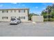 Close up of the apartment building with parking, block wall and stairwell at 2893 S Osceola Ave # E6, Orlando, FL 32806