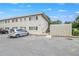 Exterior shot of the apartment building with reserved parking spaces in front at 2893 S Osceola Ave # E6, Orlando, FL 32806