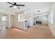 Bright open-concept with wood floors, kitchen bar and large mirror wall at 2893 S Osceola Ave # E6, Orlando, FL 32806