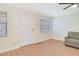 Living area with a modern door, natural light, and light hardwood flooring at 2893 S Osceola Ave # E6, Orlando, FL 32806
