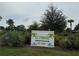 Sign showing the way to the community splash pad, named 'El Yunque' at 300 Florida Pkwy, Kissimmee, FL 34743