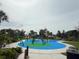 This photograph shows a vibrant splash pad with various water features and a seating area at 300 Florida Pkwy, Kissimmee, FL 34743