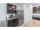 Close up of kitchen featuring granite countertops, stainless steel refrigerator at 3235 Utah Dr, Deltona, FL 32738
