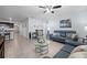 Open living space with tiled floors and comfortable seating at 3235 Utah Dr, Deltona, FL 32738