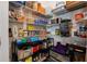 Walk-in pantry with shelving that provides plenty of storage space at 3235 Utah Dr, Deltona, FL 32738