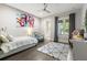 Bright bedroom with a ceiling fan, natural light, and a decorative rug at 3428 Chaine Du Lac Blvd, Windermere, FL 34786