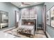 Charming bedroom with bunk beds, complemented by a decorative rug and soft-colored curtains, perfect for  at 3428 Chaine Du Lac Blvd, Windermere, FL 34786