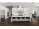 Bright and modern kitchen with a large island and seating, perfect for entertaining at 3428 Chaine Du Lac Blvd, Windermere, FL 34786