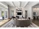Expansive living room featuring vaulted ceilings and designer lighting fixtures at 3428 Chaine Du Lac Blvd, Windermere, FL 34786