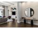 Inviting living room boasting hardwood floors, stylish furnishings, and custom built-ins at 3428 Chaine Du Lac Blvd, Windermere, FL 34786