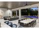 Beautiful outdoor patio featuring a pool, stylish seating, and an open layout perfect for relaxation and socializing at 3428 Chaine Du Lac Blvd, Windermere, FL 34786