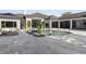 A resort-style pool surrounded by an expansive patio and lush landscaping at 3428 Chaine Du Lac Blvd, Windermere, FL 34786