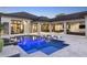 An inviting backyard with a pool, lounge chairs, and views of the home's architecture, ideal for outdoor enjoyment at 3428 Chaine Du Lac Blvd, Windermere, FL 34786
