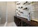 Modern wine cellar featuring temperature control, beautiful lighting, and ample storage at 3428 Chaine Du Lac Blvd, Windermere, FL 34786