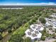 Aerial view of apartments nestled in mature Florida landscaping at 3944 Atrium Dr # 4, Orlando, FL 32822