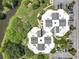 An aerial view of condo rooftops next to a parking lot at 3944 Atrium Dr # 4, Orlando, FL 32822