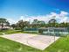 Basketball court adjacent to other community recreation area, including tennis courts and a covered picnic spot at 3944 Atrium Dr # 4, Orlando, FL 32822