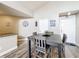 The dining area includes a dark wood table and seating, creating a functional space for enjoying meals and hosting gatherings at 3944 Atrium Dr # 4, Orlando, FL 32822