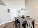 The dining area offers a simple aesthetic with a dark wood table, perfect for intimate meals and casual gatherings at 3944 Atrium Dr # 4, Orlando, FL 32822