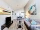 The living room showcases a spacious design, complemented by stylish decor, including sleek floors and high ceilings at 3944 Atrium Dr # 4, Orlando, FL 32822