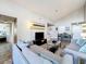 This open-concept living room features stylish furnishings, wood floors, and seamless flow for modern living and entertaining at 3944 Atrium Dr # 4, Orlando, FL 32822