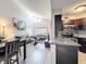 Spacious living room with high ceilings, natural light and open sight lines to the kitchen and dining area at 3944 Atrium Dr # 4, Orlando, FL 32822