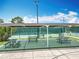 Covered picnic area with multiple tables, adjacent to tennis courts, offering a relaxing space for outdoor gatherings at 3944 Atrium Dr # 4, Orlando, FL 32822