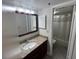 Updated bathroom with modern vanity, granite counters, and a shower-tub combination at 6337 Parc Corniche Dr # 2311, Orlando, FL 32821