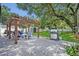 Entertaining area with a patio, outdoor grill, a shed, and a large backyard at 727 Seminole Ave, Orlando, FL 32804