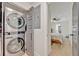 View from hallway of bedroom suite with ensuite bathroom and laundry area at 727 Seminole Ave, Orlando, FL 32804
