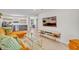 Inviting living room featuring modern decor, and a view of the bar area with wine cooler at 727 Seminole Ave, Orlando, FL 32804
