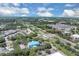 The aerial shot showcases the property's proximity to shopping, healthcare, and major roadways in a vibrant locale at 736 Timacuan Blvd, Lake Mary, FL 32746