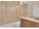 Small bathroom with tub and shower combo and vanity with sink at 736 Timacuan Blvd, Lake Mary, FL 32746