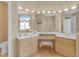 Bright bathroom vanity with double sinks and neutral decor creates a relaxing and functional space at 736 Timacuan Blvd, Lake Mary, FL 32746