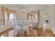 Elegant dining room with crystal chandelier, glass table, and modern acrylic chairs at 736 Timacuan Blvd, Lake Mary, FL 32746