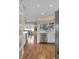 Bright kitchen flows into the living area and boasts modern stainless steel appliances at 736 Timacuan Blvd, Lake Mary, FL 32746