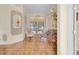 Open-plan living room with traditional décor, columns, and large windows with views at 736 Timacuan Blvd, Lake Mary, FL 32746