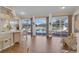 Bright sunroom with large sliding glass doors that open up to the pool area at 736 Timacuan Blvd, Lake Mary, FL 32746
