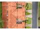 Top-down aerial view showcases terracotta roofs, meticulous landscaping, and symmetrical townhome design at 7528 Chapelhill Dr, Orlando, FL 32819