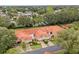 Scenic aerial view of townhomes featuring terracotta tile roofs and manicured landscaping at 7528 Chapelhill Dr, Orlando, FL 32819