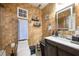 Bathroom featuring textured tile, neutral paint, toilet, and sink area at 874 Brevard Ct, Orlando, FL 32822