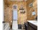 Bathroom featuring textured tile, neutral paint, toilet, and sink area at 874 Brevard Ct, Orlando, FL 32822
