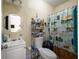 Standard bathroom with a vanity, toilet, and shower with a decorative curtain at 874 Brevard Ct, Orlando, FL 32822