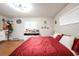 Bright bedroom with large window, vanity, and red accents at 874 Brevard Ct, Orlando, FL 32822