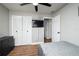 Bedroom featuring wood flooring, closet, and overhead lighting at 874 Brevard Ct, Orlando, FL 32822